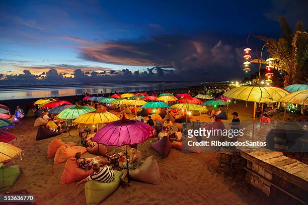 seminyak beach at dusk - indonesia stock pictures, royalty-free photos & images