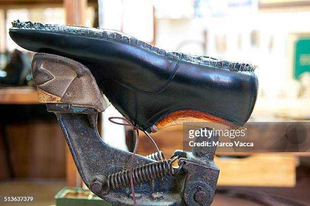 hand made shoe in a shoetree - scarpe stock-fotos und bilder