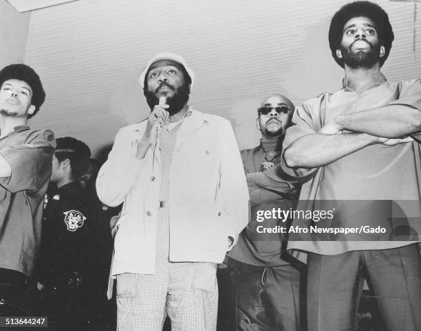 Writer and social activist Dick Gregory wearing hat, speaking to the crowd during a Black Panther event, New Jersey, November 2, 1968.