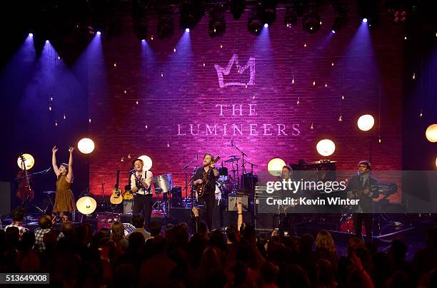 Musicians Neyla Pekarek, Jeremiah Fraites, Wesley Schultz, Byron Isaacs and Stelth Ulvang of The Lumineers perform on the AT&T LIVE stage at the...