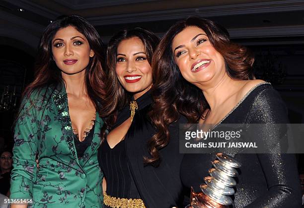 Indian Bollywood actresses Shilpa Shetty, Bipasha Basu and Sushmita Sen pose as they attend the GeoSpa asiaSpa India Awards 2015 in Mumbai late March...