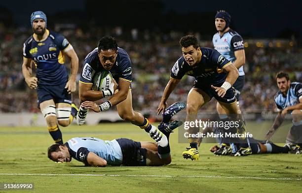 Christian Lealiifano of the Brumbies scores a try during the round two NRL match between the Brumbies and the Waratahs at GIO Stadium on March 4,...