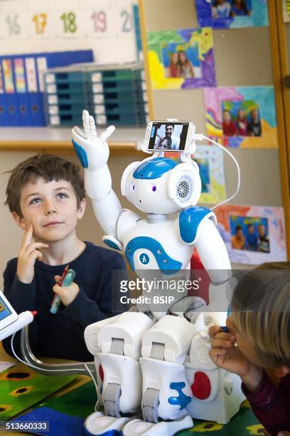Reportage on the Avatar Kids project, which allows children and teenagers who have to be hospitalised to be present in the classroom through Nao, a...