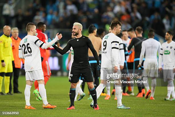 Romain Alessandrini of Marseille and Tony Lambard of Granville during the French Cup game between US Granville V Olympique de Marseille at Stade...