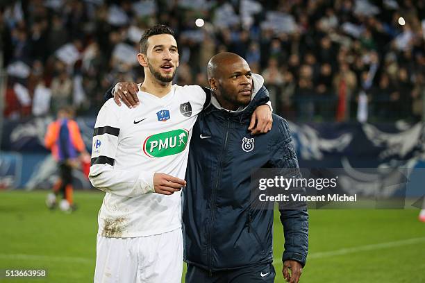 Antoine Peron and Arnaud Jerome of Granville celebrate with their supporters at the end of the match during the French Cup game between US Granville...