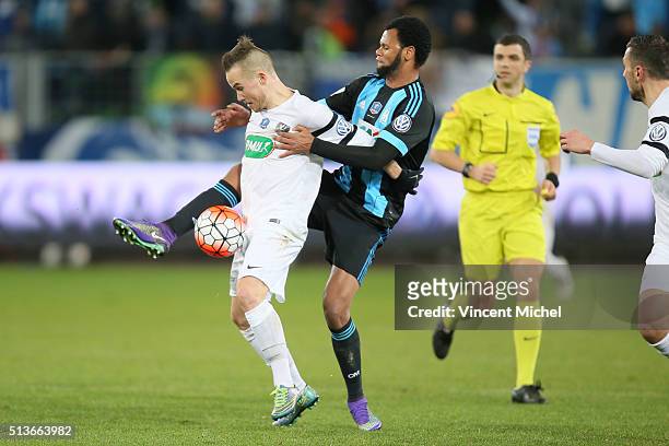 Florian Jegu of Granville and Rolando of Marseille during the French Cup game between US Granville V Olympique de Marseille at Stade Michel D'Ornano...