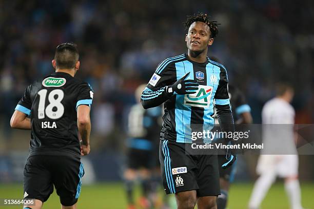 Michy Batshuayi of Marseille celebrates after scoring the first goal during the French Cup game between US Granville V Olympique de Marseille at...