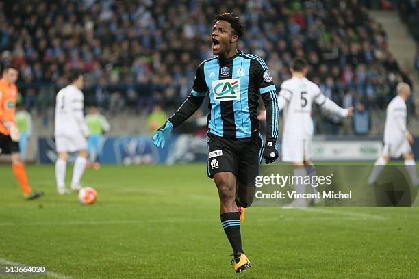 Michy Batshuayi of Marseille celebrates after scoring the first goal during the French Cup game between US Granville V Olympique de Marseille at...