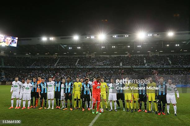 The two teams before the start of the match during the French Cup game between US Granville V Olympique de Marseille at Stade Michel D'Ornano on...