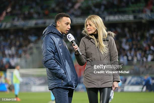 Clement Daouda of Granville and Carine Galli during the French Cup game between US Granville V Olympique de Marseille at Stade Michel D'Ornano on...