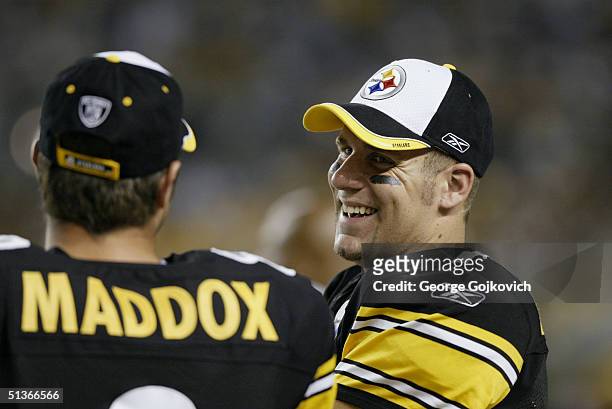 Quarterbacks Ben Roethlisberger and Tommy Maddox of the Pittsburgh Stelers talk during the Carolina Panthers 16-13 preseason game victory over the...