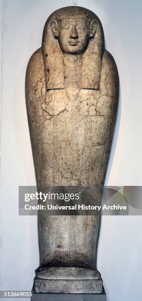 Limestone anthropoid coffin lid of Padihorhephep. Ptolemaic Period, about 200 BC. Beneath the broad collar hangs a pectoral containing seated figures...