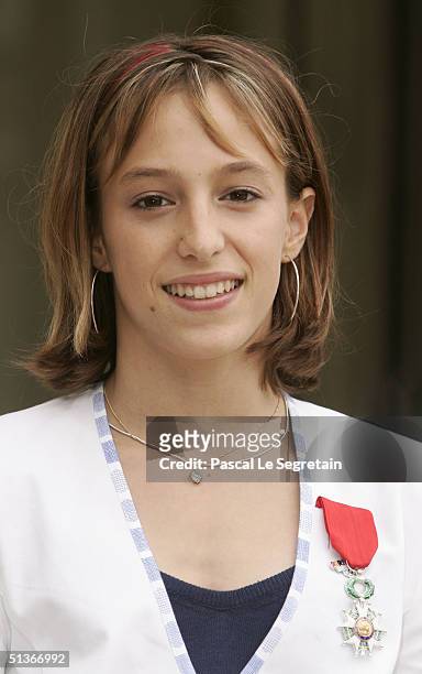 Emilie Le Pennec of France poses in the courtyard of the Elysee Palace September 28, 2004 in Paris, France. French President Jacques Chirac awarded...