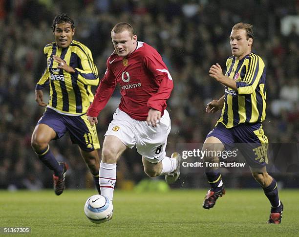 Wayne Rooney of Manchester United in action on the ball during the UEFA Champions League match between Manchester United and Fenerbahce at Old...