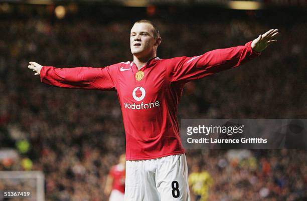 Wayne Rooney of Manchester United celebrates his second goal during the UEFA Champions League Group D match between Manchester United and Fenerbahce...