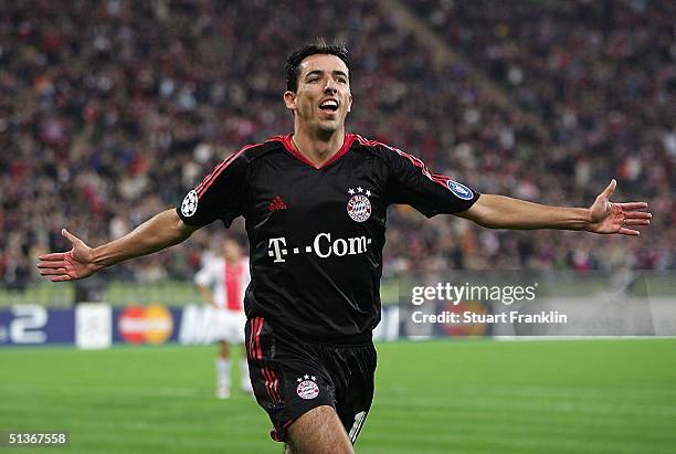 Roy Makaay of Munich celebrates scoring his first goal during The UEFA Champions League match between Bayern Munich and AFC Ajax at The Olympic...