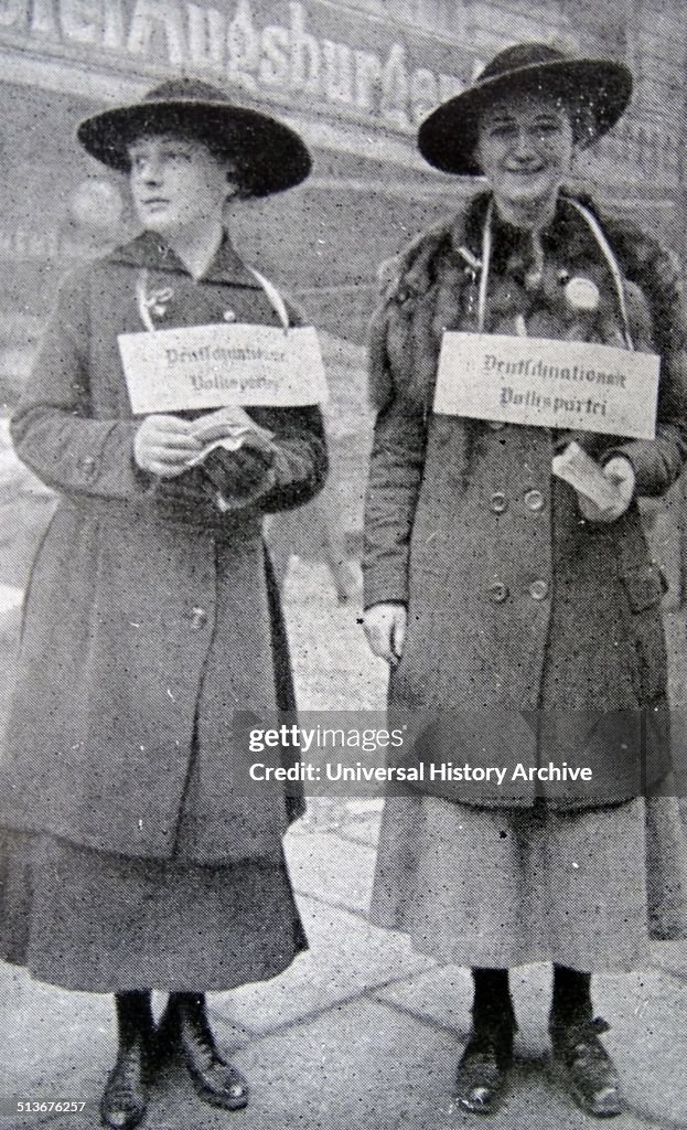 Women carrying posters in favour of the German National Party.