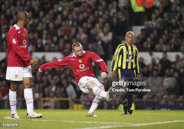 Wayne Rooney of Manchester United scores the fifth goal and completes his debut hat-trick during the UEFA Champions League match between Manchester...