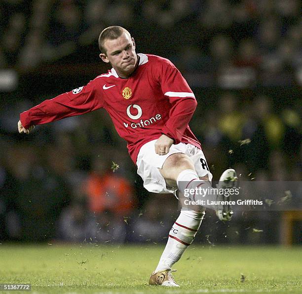 Wayne Rooney of Manchester United scores his third goal during the UEFA Champions League Group D match between Manchester United and Fenerbahce SK at...