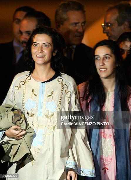 Simona Torretta , and Simona Pari, volunteers for the Italian aid organization 'Un Ponte Per Baghdad' are pictured on their arrival at Rome's...