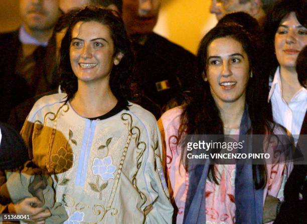 Simona Torretta , and Simona Pari, volunteers for the Italian aid organization 'Un Ponte Per Baghdad' are pictured on their arrival at Rome's...