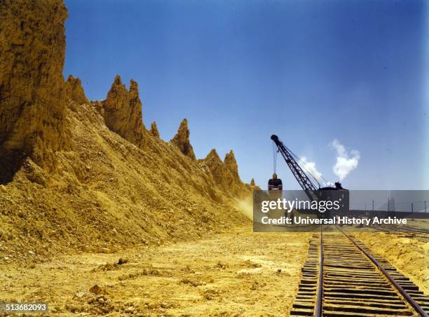 Nearly exhausted sulphur vat from which railroad cars are loaded, Freeport Sulphur Co., Hoskins Mound, Texas.