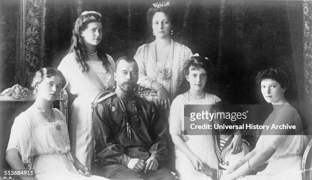 The Russian Royal family. Seated the Grand Duchess Olga, The Tsar , the Grand Duchess Anastasia, The Tsartitch Alexis, the Grand Duchess Tatiana....