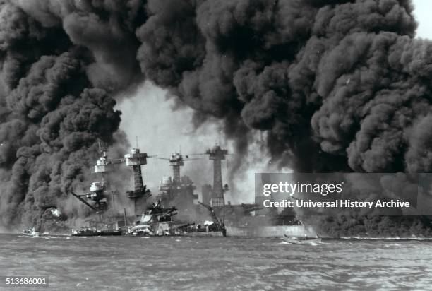 Battleships West Virginia and Tennessee burning after the Japanese attack on Pearl Harbor, 7th December 1941.