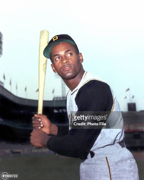 Roberto Clemente of the Pittsburgh Pirates poses for an action portrait. Roberto Clemente played for the Pirates from 1955-1972.
