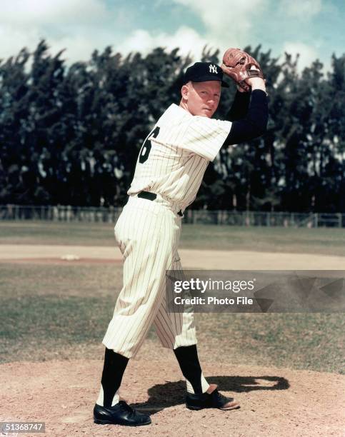 Whitey Ford of the New York Yankees poses for an action portrait. Whitey Ford played for the Yankees from 1950-1967.