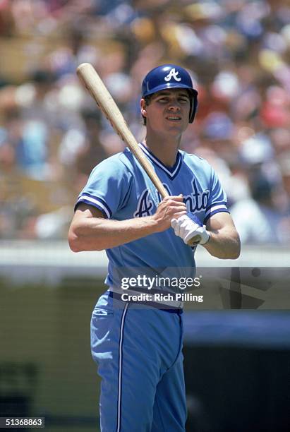 Dale Murphy of the Atlanta Braves looks on as he prepares to bat during a game in 1985.