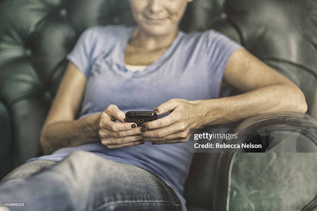 Woman checking her smart phone