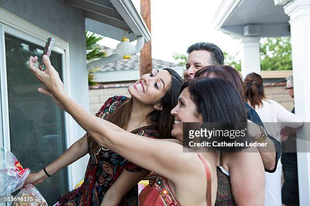 Hispanic Family taking a Selfie