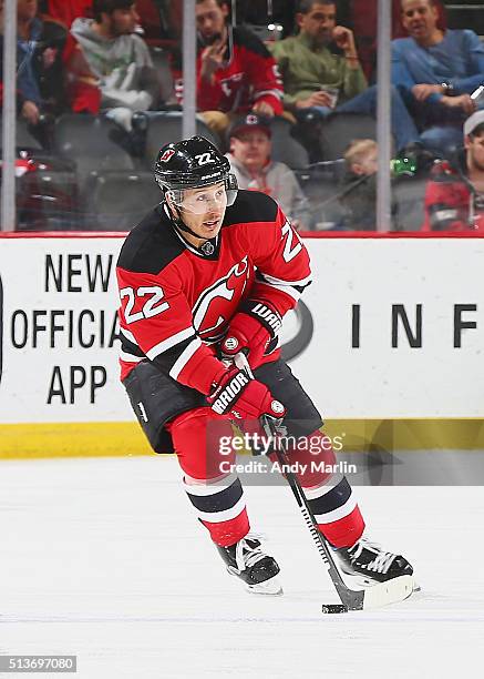 Jordin Tootoo of the New Jersey Devils plays the puck during the game against the Carolina Hurricanes at the Prudential Center on March 1, 2016 in...