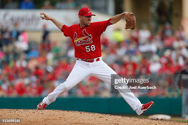 Jeremy Hefner of the St Louis Cardinals throws the ball against the Miami Marlins in the event inning during a spring training game at Roger Dean...