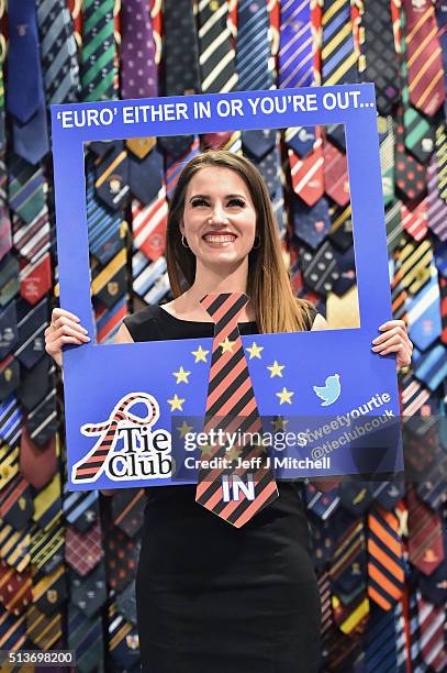 Jenifer Rankin from the tie club poses with a sign at the Scottish Conservative Party spring conference on March 4, 2016 in Edinburgh, Scotland....