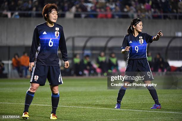 Mizuho Sakaguchi and Nahomi Kawasumi of Japan look on during the AFC Women's Olympic Final Qualification Round match between Japan and China at...