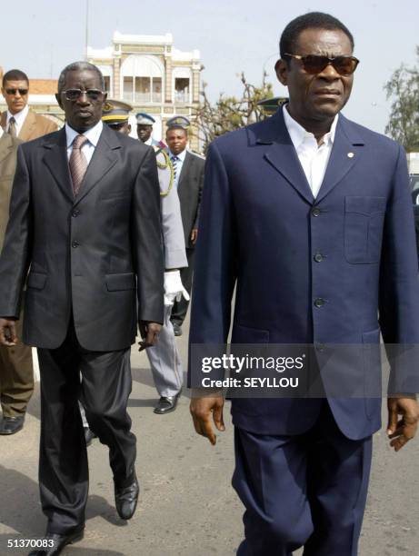 The president of Equtorial Guinea, Teodoro Obiang Nguema , and Senegalese Defense Minister Becaye Diop arrive 29 September 2004 on the Tirailleur...