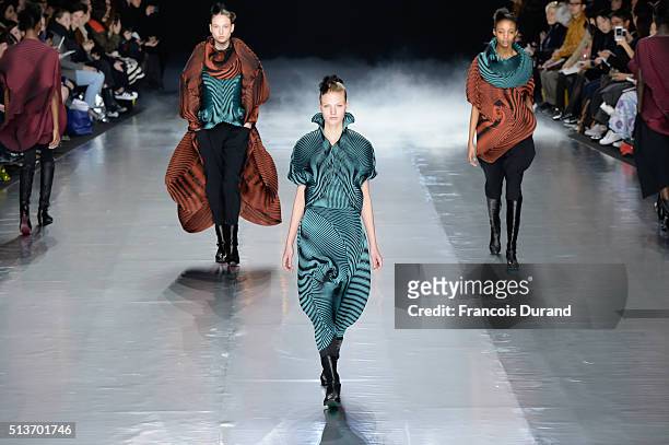 Models walk the runway during the Issey Miyake show as part of the Paris Fashion Week Womenswear Fall/Winter 2016/2017 on March 4, 2016 in Paris,...