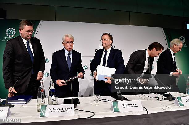 Treasurer Reinhard Grindel, DFB Vice Presidents Reinhard Rauball and Rainer Koch and Christian Duve of Freshfields Bruckhaus Deringer leave a press...