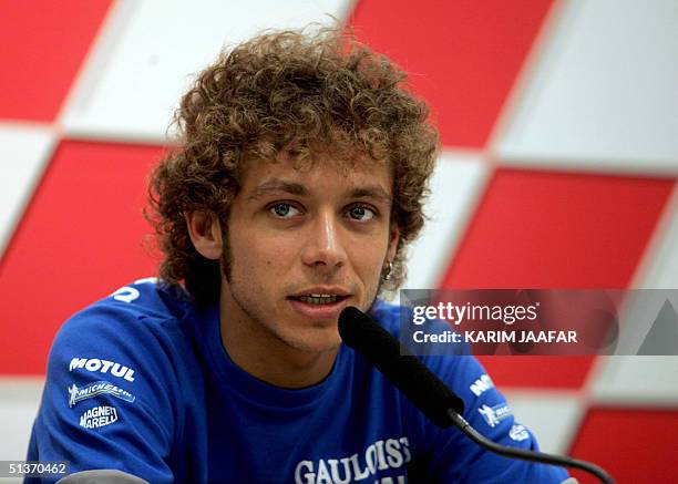 MotoGP rider Valentino Rossi gives a press conference in Doha 29 September 2004. Rossi looks to consolidate his lead at the top of the MotoGP World...