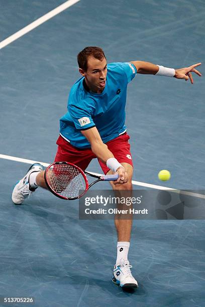 Lukas Rosol of Czech Republic plays a forehand in his match against Philipp Kohlschreiber of Germany during Day 1 of the Davis Cup World Group first...