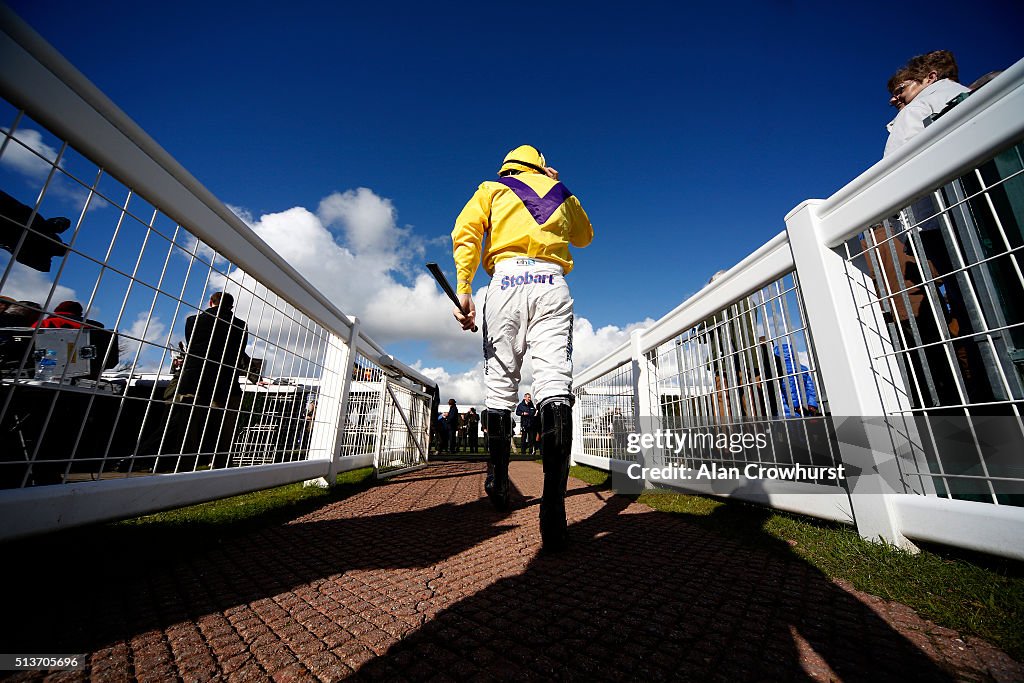Charlie Poste Racing Jockey Charlie Poste make his way into the parade ring at Newbury ...