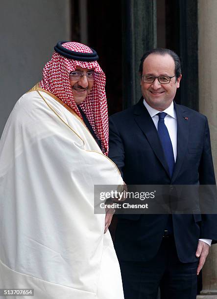 French President Francois Hollande accompanies Saudi Crown Prince Mohammed bin Nayef after their meeting at the Elysee palace on March 04, 2016 in...