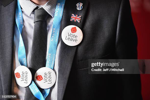 Man with vote leave EU badges attends the Scottish Conservative Party spring conference on March 4, 2016 in Edinburgh, Scotland. Prime Minister David...