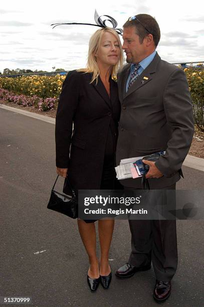 Peter Phelps and pregnant Donna Fowkes at the Melbourne Cup 2002.