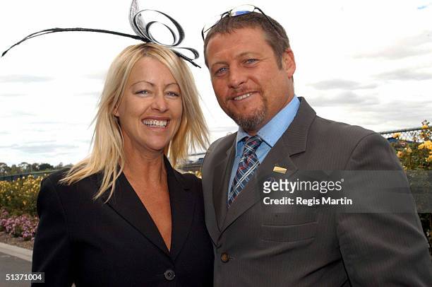 Peter Phelps and pregnant Donna Fowkes at the Melbourne Cup 2002.