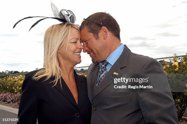 Peter Phelps and pregnant Donna Fowkes at the Melbourne Cup 2002.