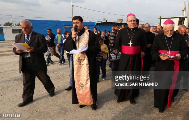 Apostolic Nuncio to Iraq and Jordan, Spanish born Archbishop Alberto Ortega Martin arrives to visit the Ashti camp housing displaced Iraqis who fled...