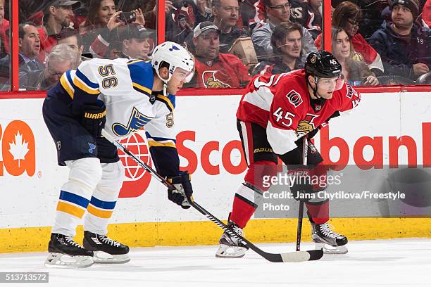 Chris Wideman of the Ottawa Senators prepares for a faceoff against Magnus Paajarvi of the St. Louis Blues during an NHL game at Canadian Tire Centre...